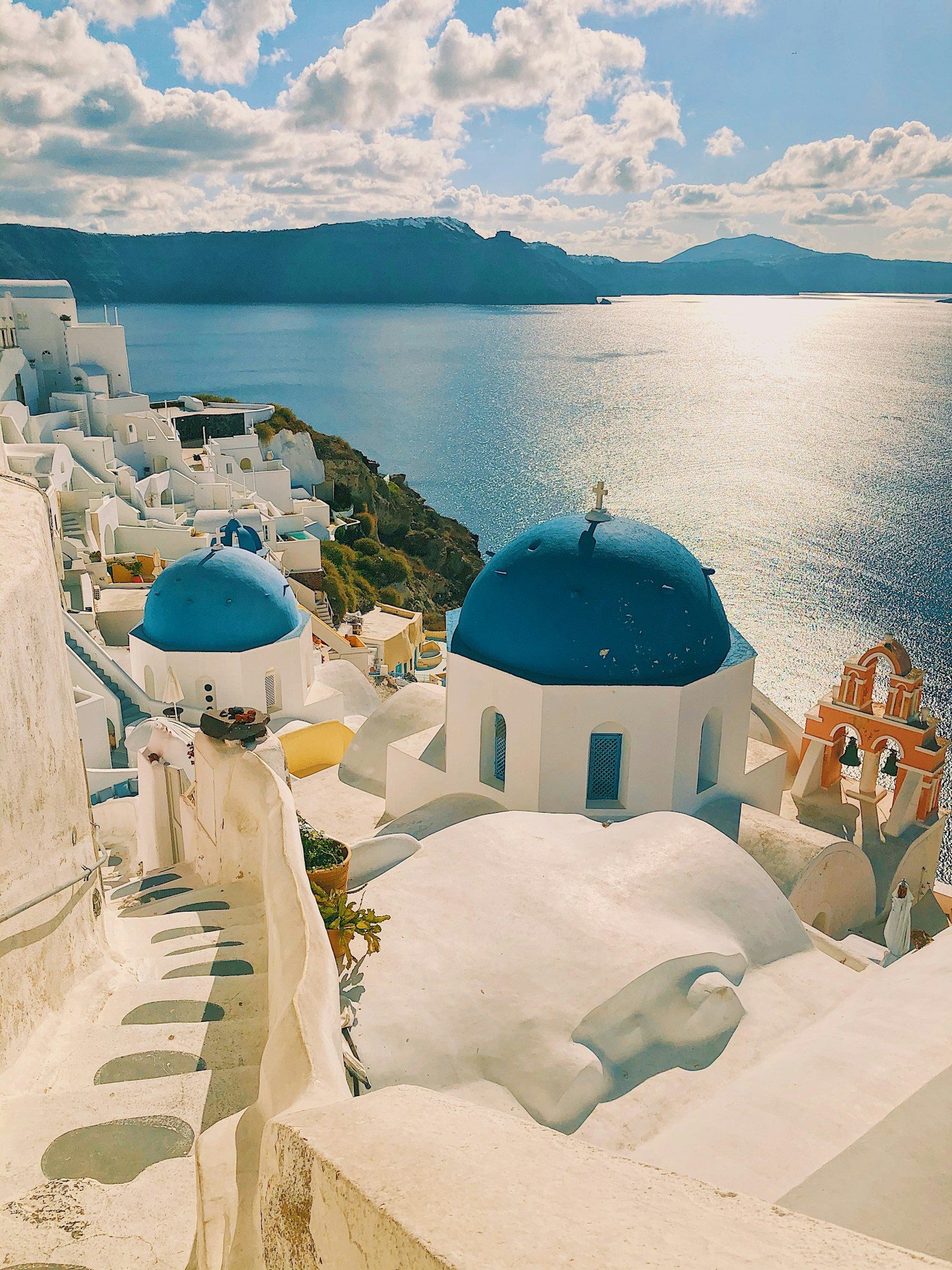 White buildings and blue domes overlooking the sea in Santorini