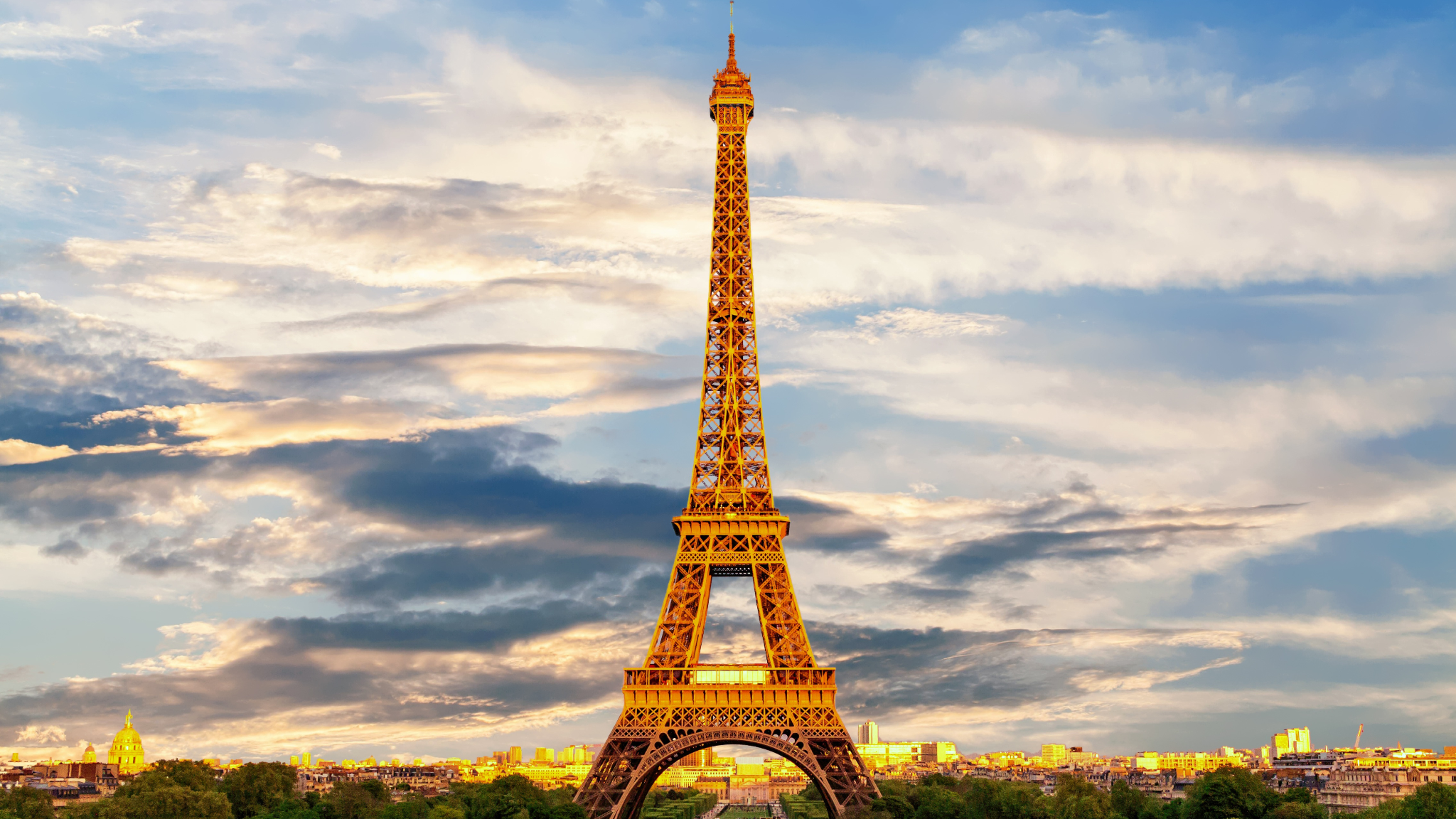 The Eiffel Tower against a colourful evening sky in Paris
