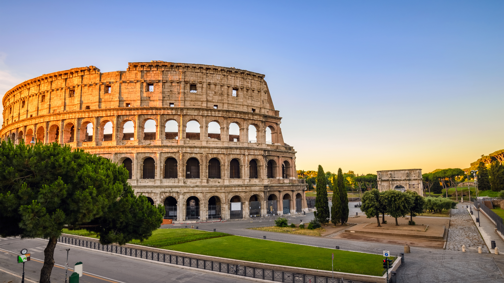 The Colosseum in Rome glowing in warm evening light